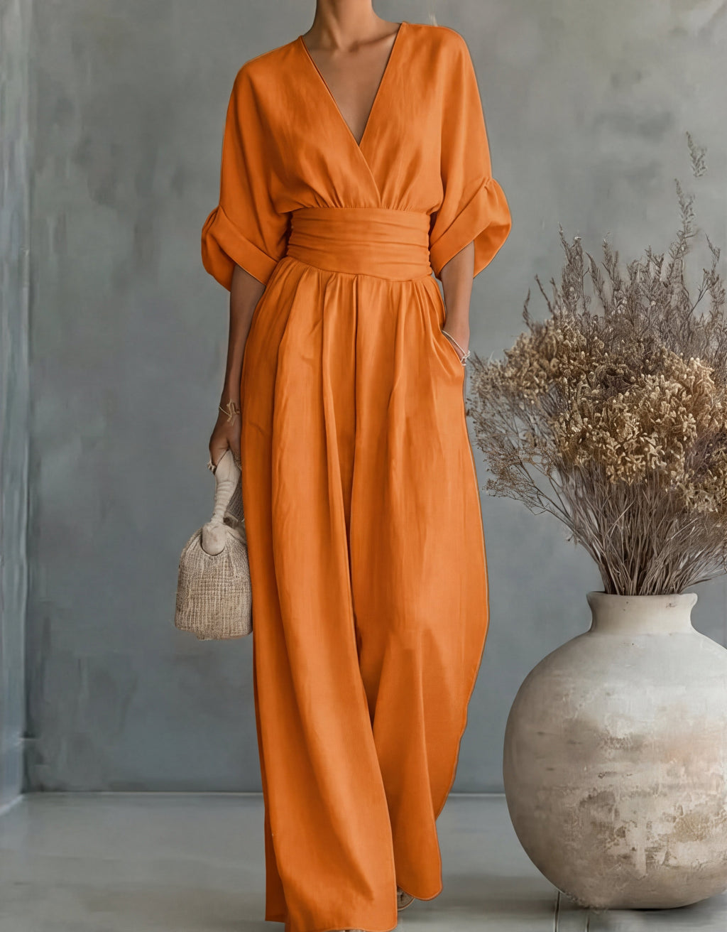 Renata | Tuta elegante con scollo a V e gamba larga